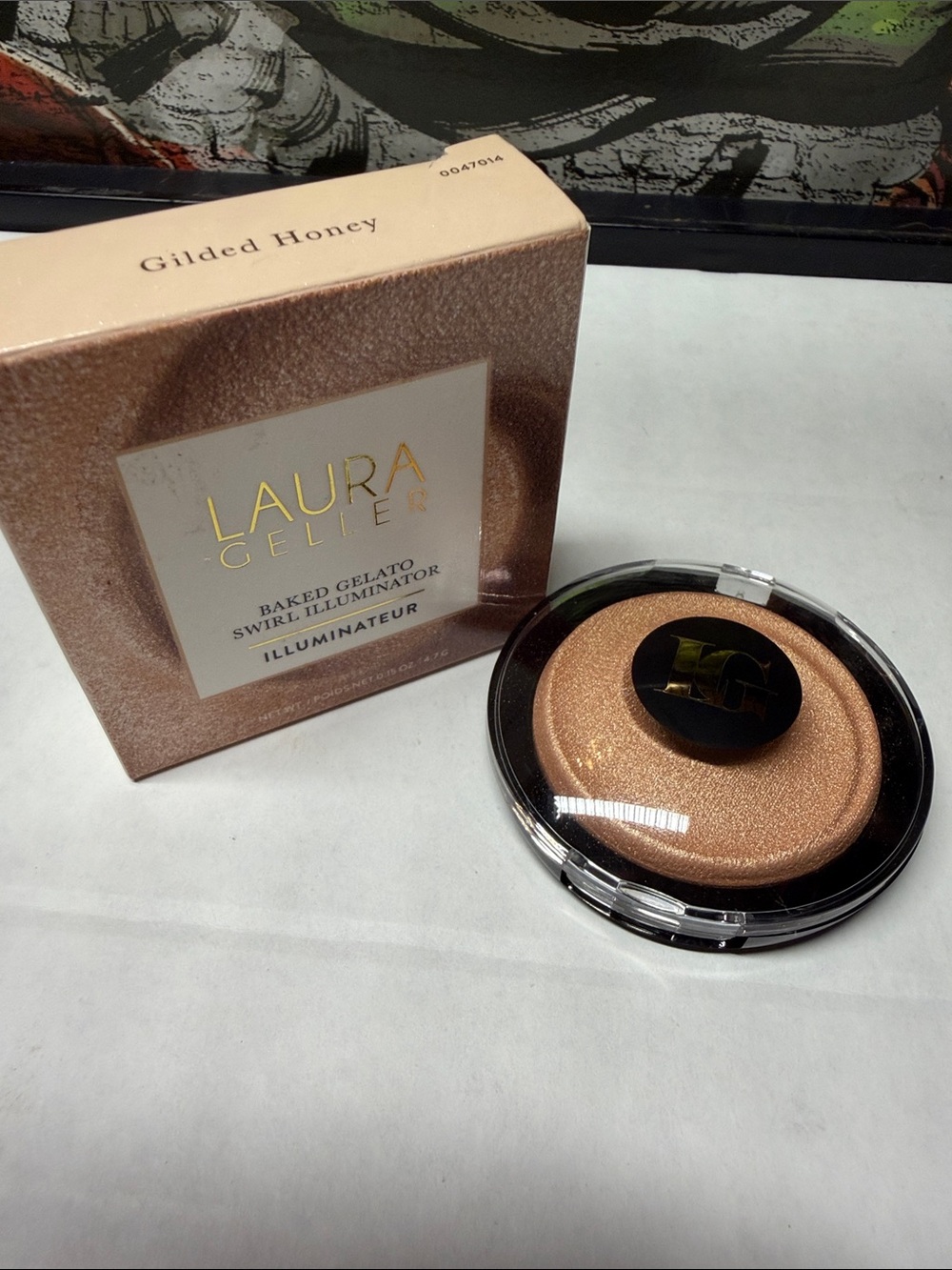 Laura Geller Baked Gelato Swirl Illuminator Gilded Honey.